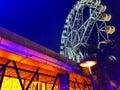 Ferris wheel night building lights Royalty Free Stock Photo