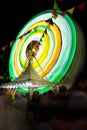 Ferris wheel at night festival in slow motion photo. High Roller.