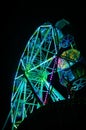 Ferris wheel at night with green light Royalty Free Stock Photo