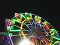 Ferris wheel with night light on Black Background.