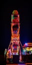 Ferris wheel at night with red light Royalty Free Stock Photo