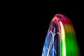 A ferris wheel in the night taken with slow shutter speed Royalty Free Stock Photo