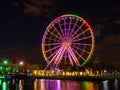 The ferris wheel of the old port of Montreal with the colors of the rainbow concerning the covid-19 Royalty Free Stock Photo