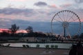 Ferris wheel in Paris. Roue de Paris. View from The Tuileries Garden. Sunset in Le jardin des Tuileries