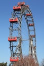 Ferris wheel with red cabines