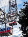 Ferris wheel with red retro cabs in Prater. Vienna Giant Wheel in Amusement Park, Vienna, Austria Royalty Free Stock Photo