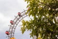 Ferris wheel with red retro cabs in Prater. Vienna Giant Wheel in Amusement Park, Vienna, Austria Royalty Free Stock Photo