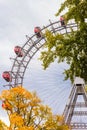 Ferris wheel with red retro cabs in Prater. Vienna Giant Wheel in Amusement Park, Vienna, Austria Royalty Free Stock Photo