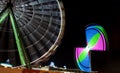 Ferris wheel rotating on an amusement park