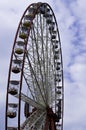 Ferris wheel on the sky with clouds background. Ukraine. Kharki Royalty Free Stock Photo