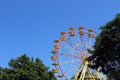 Ferris wheel . Summer fun for people. A bright sunny hot day. Royalty Free Stock Photo