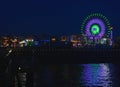 Ferris Wheel With Sunset In The Background