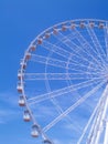 Ferris wheel under a blue sky