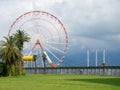 Ferris wheel. View from afar of the attraction. Resort park Royalty Free Stock Photo