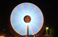 Ferris wheels in motion at night Royalty Free Stock Photo