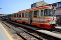 Ferrovia Circumetnea Orange and cream old rolling stock locomotive at Randazzo Station, Sicily Italy
