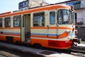 Ferrovia Circumetnea Orange and cream old rolling stock locomotive at Randazzo Station, Sicily Italy