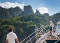 Ferry arrival and waiting tourists