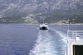 Ferry on the blue sea, mountain in the background, Croatia, Europe, Adriatic