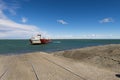 Ferry boat approaching the dock in the Cruce Punta Delgada in the Strait of Magellan, Chile. Royalty Free Stock Photo