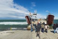 Ferry boat approaching the dock in the Cruce Punta Delgada in the Strait of Magellan, Chile. Royalty Free Stock Photo
