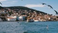 Ferry boat on background of coastline of Island Burgazada in the Sea of Marmara