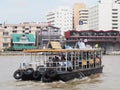Ferry boat crossing CHAO PHRAYA river in BANGKOK THAILAND Royalty Free Stock Photo