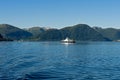 Ferry boat crossing a fjord Royalty Free Stock Photo