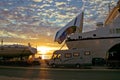 Ferry boat docks at sunset