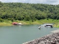 The ferry boat and floating restaurant for travel in the large reservoir