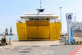Ferry boat opens its cargo hold in Piombino seaport, Italy