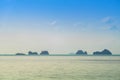 A ferry boat operating between Koh Samui and Koh Phangan. Five Sisters Islands in serene water surface. Enchanting landscape, Royalty Free Stock Photo