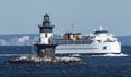 Ferry boat passing Orient Point lighthouse