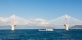 Ferry boat sailing under suspension bridge Royalty Free Stock Photo