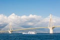 Ferry boat sailing under suspension bridge Royalty Free Stock Photo