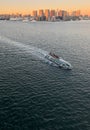 ferry boat with the skyline of Tokyo in the background during sunset Royalty Free Stock Photo