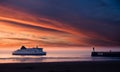 Ferry boat on the sunset in the sea Royalty Free Stock Photo