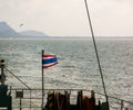 Ferry boat with thai flag to Koh Samui island, seascape Royalty Free Stock Photo