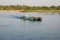 Ferry boot passes the Nile river