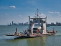 A ferry carrying a cement lorry crosses the Mekong River between Koh Dach / Silk Island and Phnom Penh