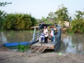 A ferry carrying people across river in Vinh Long, southern Vietnam