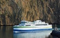 A ferry approaches the harbour at Heimaey, Vestmannaeyar, Iceland Royalty Free Stock Photo