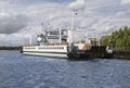 Ferry with cars floating across the river Royalty Free Stock Photo