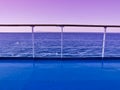 Ferry deck and railings with sea and horizon line Royalty Free Stock Photo