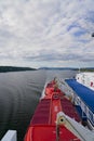 Ferry DFDS MS Crown Seaways Rear view over lifeboats and Fjord coastal landscape Royalty Free Stock Photo