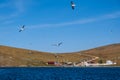 Ferry dock on the island of Olkhon with seagulls. Baikal Lake in autumn. Strait Olkhonskie Vorota and regular passenger