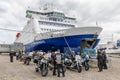 Ferry in Dutch harbor IJmuiden with motorcyclists waiting to embark.