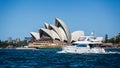 Ferry and a fast cruising boat in front of Sydney Opera House taken in Sydney, NSW, Australia Royalty Free Stock Photo