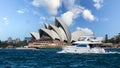 Ferry and a fast cruising boat in front of Sydney Opera House taken in Sydney, NSW, Australia Royalty Free Stock Photo