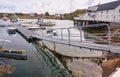 Ferry, fishing boats on the Norwegian harbor Royalty Free Stock Photo